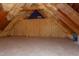 Open attic with insulation and wooden beams at 3109 Doe Hill Ct, Raleigh, NC 27612