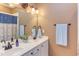 This bathroom features a double sink vanity, mirror and towel racks at 3109 Doe Hill Ct, Raleigh, NC 27612