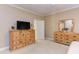 This bedroom features neutral walls, carpet, and wooden furnishings at 3109 Doe Hill Ct, Raleigh, NC 27612
