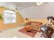 Bright bonus room with a ceiling fan, offering a comfortable space for relaxing and exercising at 3109 Doe Hill Ct, Raleigh, NC 27612