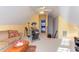 Bonus room with a comfortable couch and fitness equipment, perfect for a versatile living space at 3109 Doe Hill Ct, Raleigh, NC 27612
