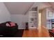 Cozy game room featuring a comfortable couch and an entertainment center at 3109 Doe Hill Ct, Raleigh, NC 27612