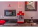 The snack bar features a microwave, granite countertop, and popcorn maker for convenience in this home theater at 3109 Doe Hill Ct, Raleigh, NC 27612