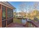 Screened-in porch overlooking the green backyard at 3109 Doe Hill Ct, Raleigh, NC 27612