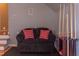 Cozy sitting area with comfortable seating and a pool-stick holder for added entertainment at 3109 Doe Hill Ct, Raleigh, NC 27612