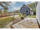 Backyard featuring a wooden deck and fire pit, offering outdoor relaxation at 3746 Guess Rd, Durham, NC 27705