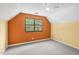 Bright bedroom features angled walls, neutral carpet, a ceiling fan and a window with natural light at 3746 Guess Rd, Durham, NC 27705