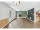 Open living room featuring wood floors, fireplace, and a neutral palette for a modern, spacious feel at 3746 Guess Rd, Durham, NC 27705