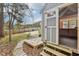 Backyard shed with open door, wooden stairs and wooden floors offers the perfect space for storage at 3746 Guess Rd, Durham, NC 27705