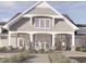 Exterior of community clubhouse with welcoming entrance and landscaped walkway at 3933 Willow Gate Way, Knightdale, NC 27604