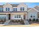Charming new construction townhome with modern design and inviting front porch at 3933 Willow Gate Way, Knightdale, NC 27604