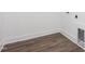 Laundry room with wood-look flooring and hookups for a washer and dryer at 3933 Willow Gate Way, Knightdale, NC 27604