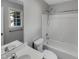 This bathroom has a combination tub and shower at 4804 Red Coat Ct, Raleigh, NC 27616