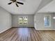 The living room has wood laminate flooring at 4804 Red Coat Ct, Raleigh, NC 27616