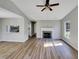 The living room has wood laminate flooring and a fireplace at 4804 Red Coat Ct, Raleigh, NC 27616