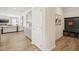 Hallway with modern cabinets, a coat rack, and access to the living area at 4879 Pioneer Dr, Sanford, NC 27330