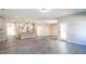 Spacious open-concept living room flows into a modern kitchen, perfect for entertaining at 4879 Pioneer Dr, Sanford, NC 27330