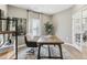 Bright home office featuring natural light and a view into the dining room at 4879 Pioneer Dr, Sanford, NC 27330