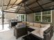 Enjoy the outdoor living space with a gazebo, comfortable seating, and outdoor cooking at 516 Spaulding St, Burlington, NC 27215
