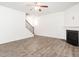 Spacious living room with fireplace, modern flooring, staircase, and abundant natural light at 516 Spaulding St, Burlington, NC 27215