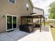 The patio includes outdoor seating and a gazebo, accessible via sliding glass doors at 516 Spaulding St, Burlington, NC 27215