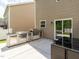 This backyard patio boasts a full outdoor kitchen with stainless steel appliances at 516 Spaulding St, Burlington, NC 27215