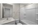 Neutral bathroom with shower/tub combo and single sink vanity at 521 Fife Ct, Gibsonville, NC 27249