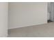 Neutral carpeted bedroom showing doorway to bathroom at 521 Fife Ct, Gibsonville, NC 27249