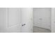 Hallway featuring closet doors, neutral colored walls, and plush carpeting at 521 Fife Ct, Gibsonville, NC 27249