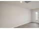 Spacious living room with wood-look floors and a glass door leading to the outdoors at 521 Fife Ct, Gibsonville, NC 27249