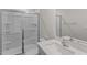 Bathroom featuring a glass enclosed shower, toilet, and single vanity at 523 Fife Ct, Gibsonville, NC 27249