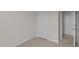 Neutral bedroom featuring modern carpet, white walls and a closet for ample storage space at 523 Fife Ct, Gibsonville, NC 27249