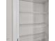 A bright walk-in closet features multiple levels of wire shelving at 523 Fife Ct, Gibsonville, NC 27249