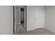 Hallway featuring neutral colored carpet and white trim and doors at 523 Fife Ct, Gibsonville, NC 27249