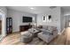 Comfortable living room featuring contemporary furnishings and a flat screen TV at 629 Kenyon Spring Dr, Zebulon, NC 27597
