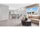 Open sitting area with comfortable furnishings and a window providing plenty of natural light at 637 Emerald Bay Cir, Raleigh, NC 27610