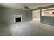 Spacious living room featuring a fireplace and views of the kitchen at 76 Mangrove Ct, Four Oaks, NC 27524