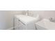 Functional laundry room with washer, dryer, and sink for efficient chores at 764 Swim Cave Ln, Wendell, NC 27591