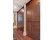 Custom closet with dark wood cabinets and drawers providing great storage and organization at 805 Greenwood Rd, Chapel Hill, NC 27514