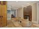 Warm, cozy interior with a fireplace and an open entrance to the formal dining room at 805 Greenwood Rd, Chapel Hill, NC 27514