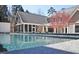 Beautiful in-ground pool with clear water and well-maintained surroundings at 805 Greenwood Rd, Chapel Hill, NC 27514