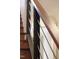 Staircase featuring metal and wood railings and wood treads at 805 Greenwood Rd, Chapel Hill, NC 27514
