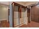 A spacious walk-in closet with custom shelving and closet rods for ample storage at 805 Greenwood Rd, Chapel Hill, NC 27514