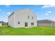 Exterior home view with green lawn and siding at 857 Forth Ct, Gibsonville, NC 27249