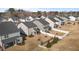 Aerial view of homes in neighborhood featuring small backyards, basic landscaping and screened in porches at 917 Matterhorn Dr, Fuquay Varina, NC 27526