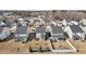 Aerial view of homes in neighborhood, featuring small backyards with screened in porches at 917 Matterhorn Dr, Fuquay Varina, NC 27526