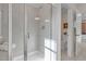 Modern bathroom featuring a glass-enclosed shower with multiple shower heads, next to the toilet at 917 Matterhorn Dr, Fuquay Varina, NC 27526