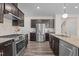 Well-equipped kitchen with stainless steel appliances, granite countertops, and plenty of cabinet space at 917 Matterhorn Dr, Fuquay Varina, NC 27526