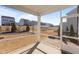 Screened patio overlooks the backyard with mature trees and a clear blue sky at 917 Matterhorn Dr, Fuquay Varina, NC 27526