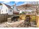 Backyard patio with an outdoor dining area and a grill at 917 Widewaters Pkwy, Knightdale, NC 27545